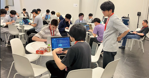 Students deeply engaged in tackling the Cryptography Hackathon